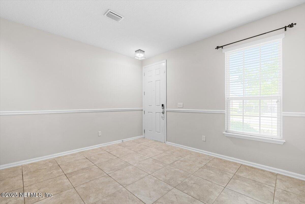 1011 Wetland Ridge Circle Middleburg, FL 32068 - Photo 9 of 73 10-Front Door Interior View