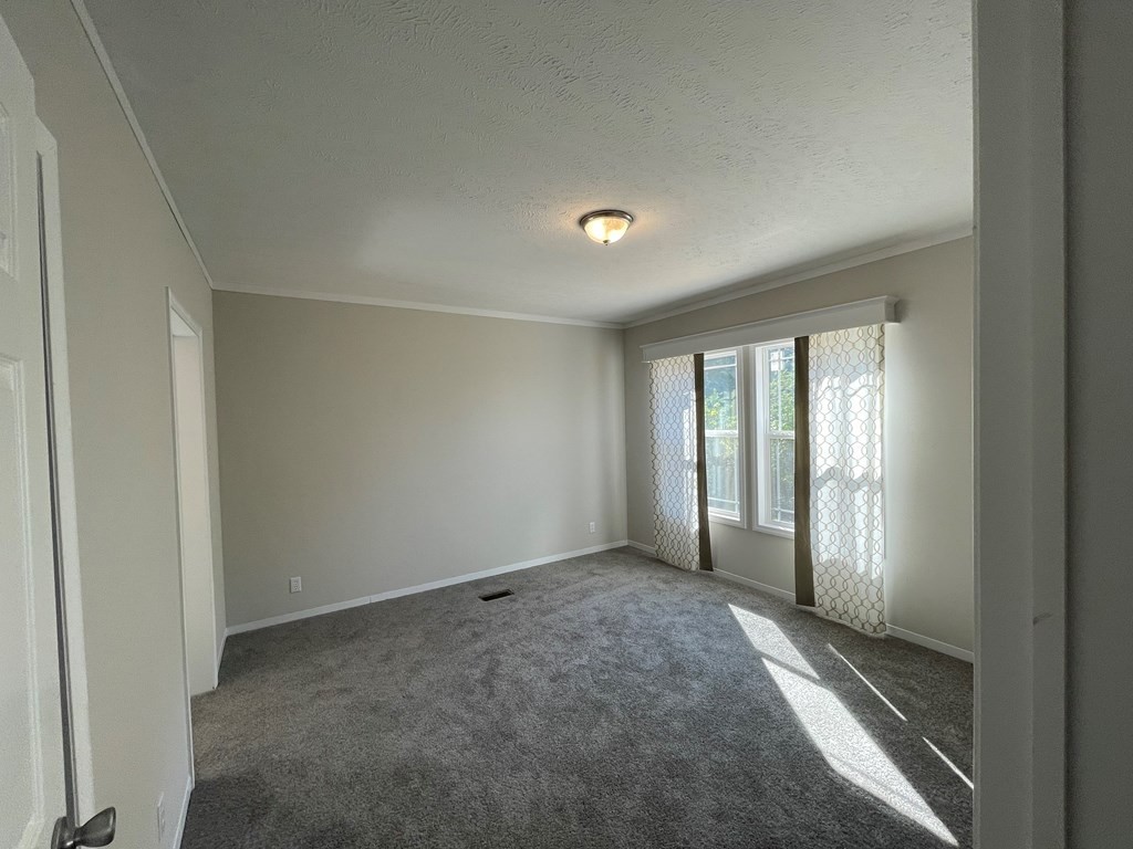 1348 Bluets Road Newport, TN 37821 - Photo 17 of 47 a view of an empty room with a window