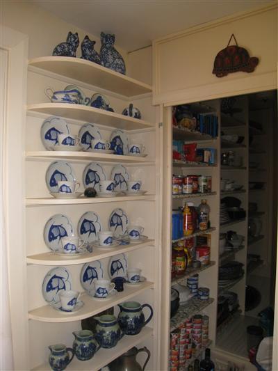 6 Shell Lane Orleans, MA 02653 - Photo 10 of 17 a shelf with books and knick knacks on it