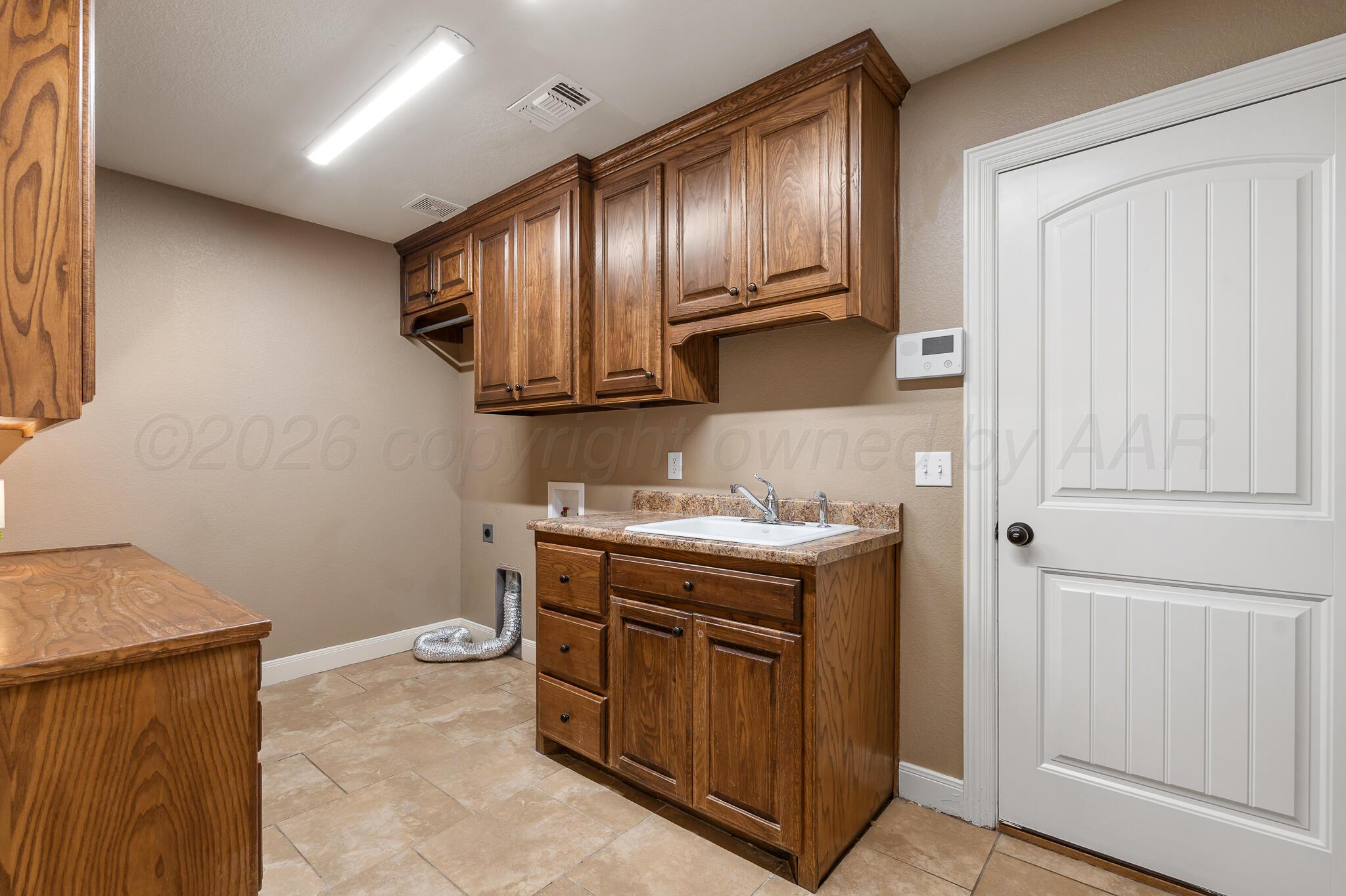 6903 Spring Cherry Lane Amarillo, TX 79124 - Photo 35 of 41 Utility Room 2