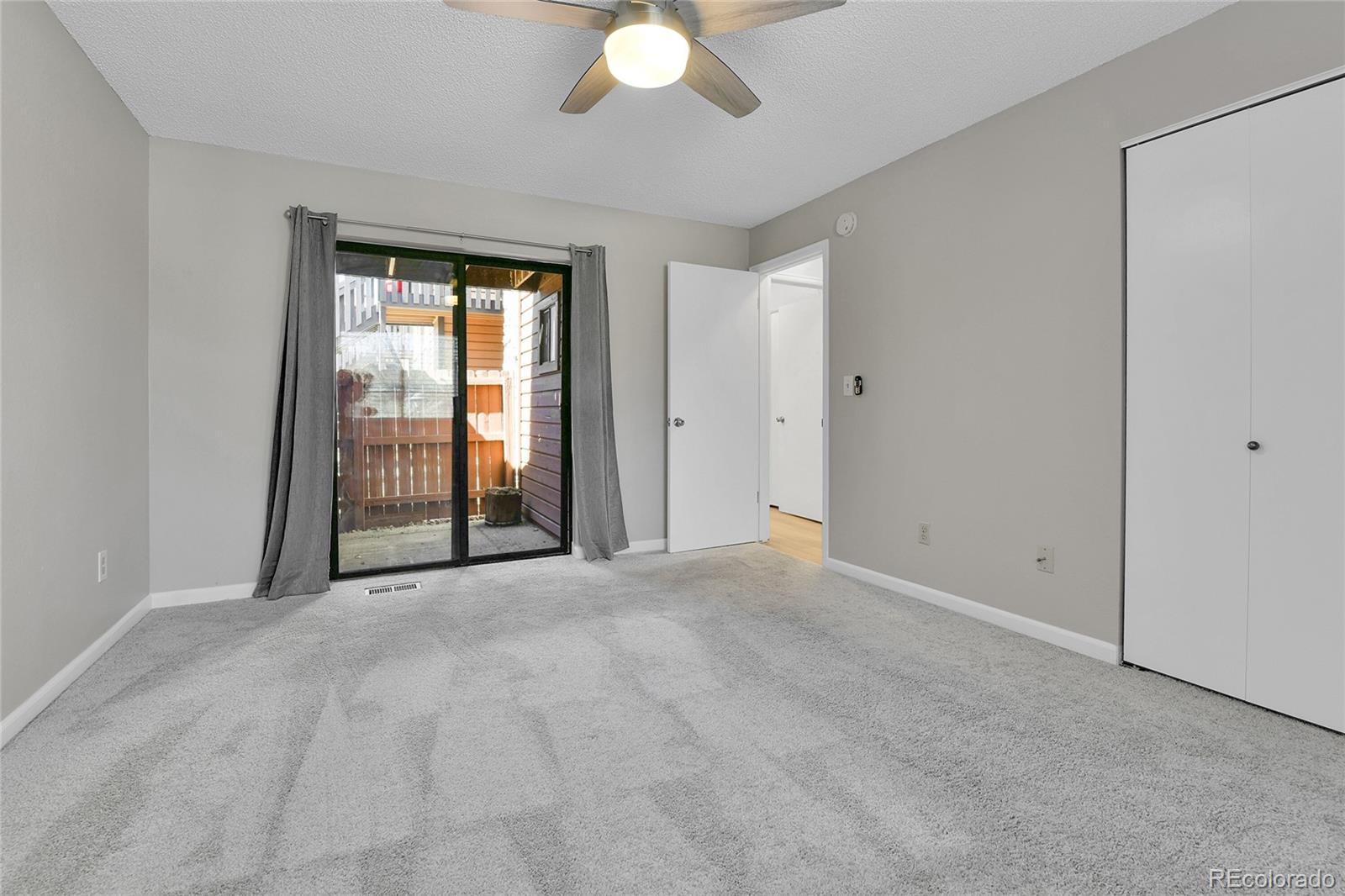 9501 West 89th Circle Broomfield, CO 80021 - Photo 15 of 33 a view of an empty room with a window