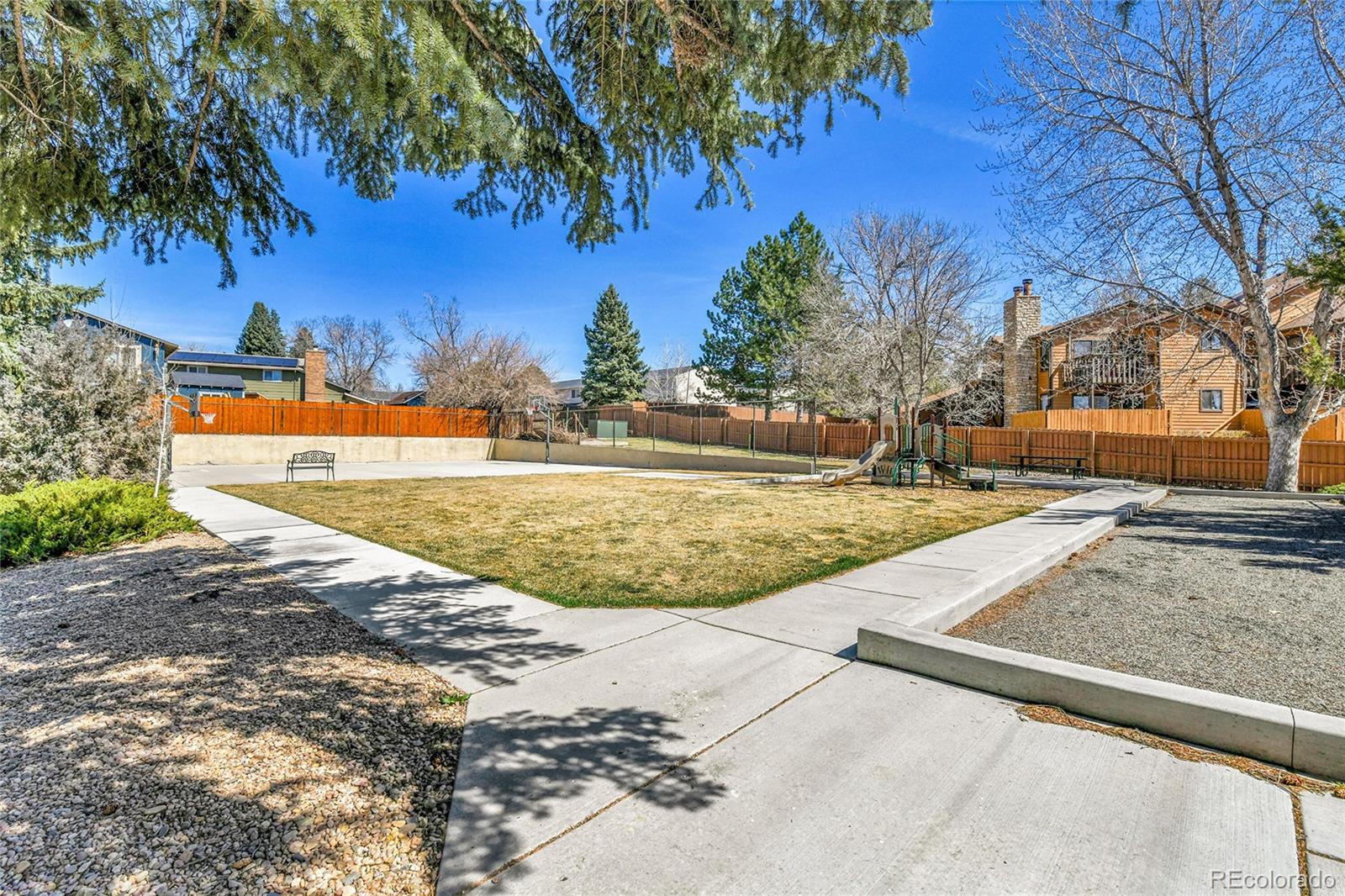 9501 West 89th Circle Broomfield, CO 80021 - Photo 28 of 33 a view of a yard with an outdoor space