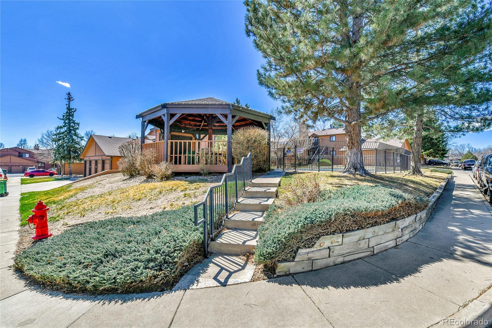 9501 West 89th Circle Broomfield, CO 80021 - Photo 29 of 33 a front view of a house with a yard