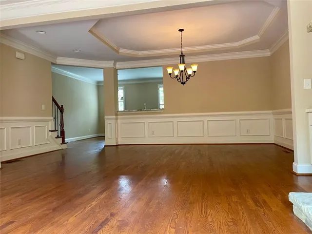 a bathroom with a toilet and a window