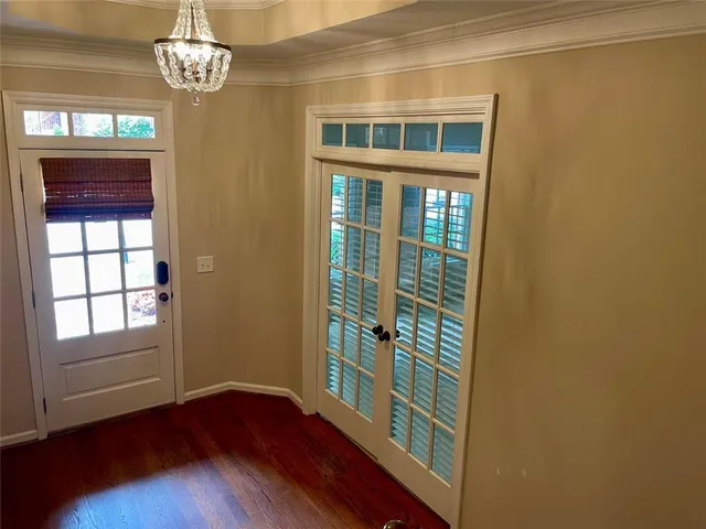 a bathroom with a toilet and shower