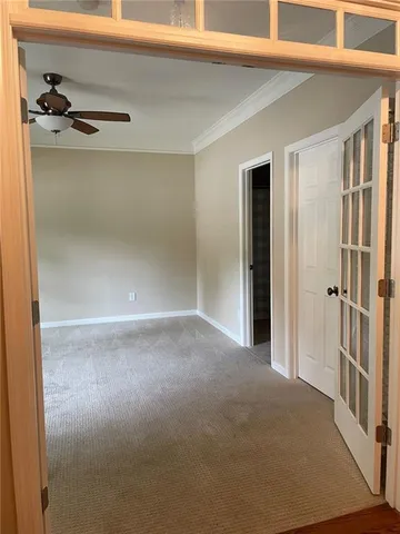 a view of a room with racks on the wall