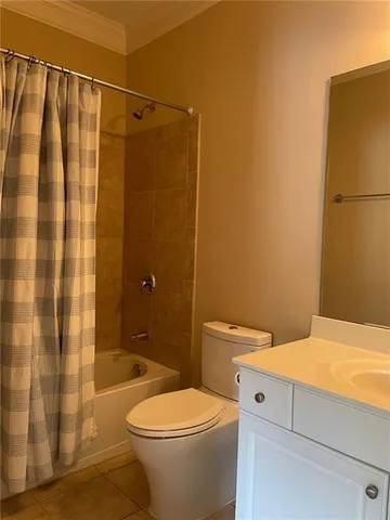 a front view of a building with barbeque area