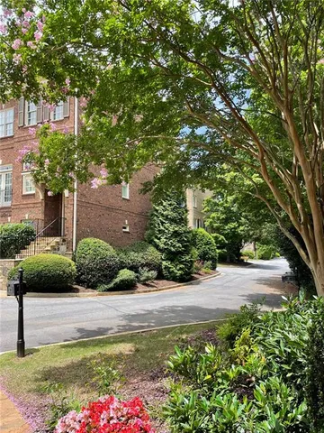a front view of a house with a garage