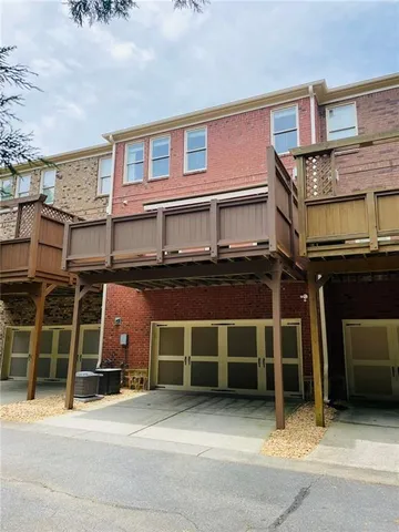 a view of swimming pool with an outdoor space and seating area