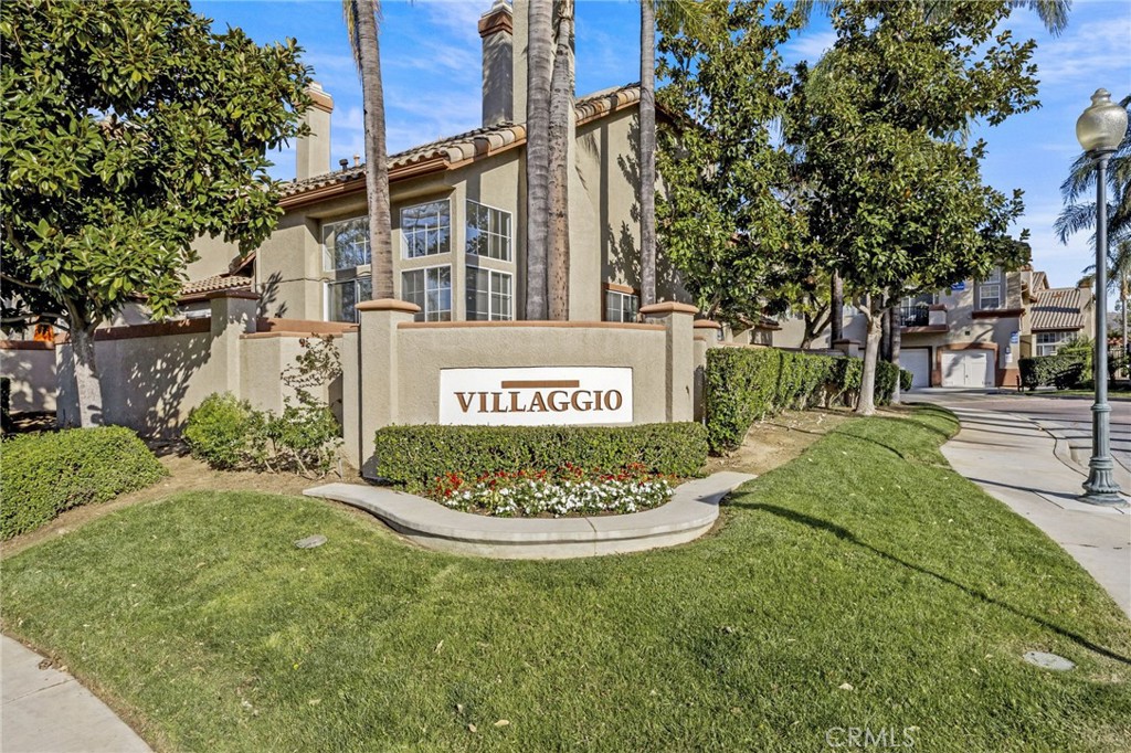 2901 Vía Toscana, Unit 101 Corona, CA 92879 - Photo 1 of 28 a sign on the side of the road