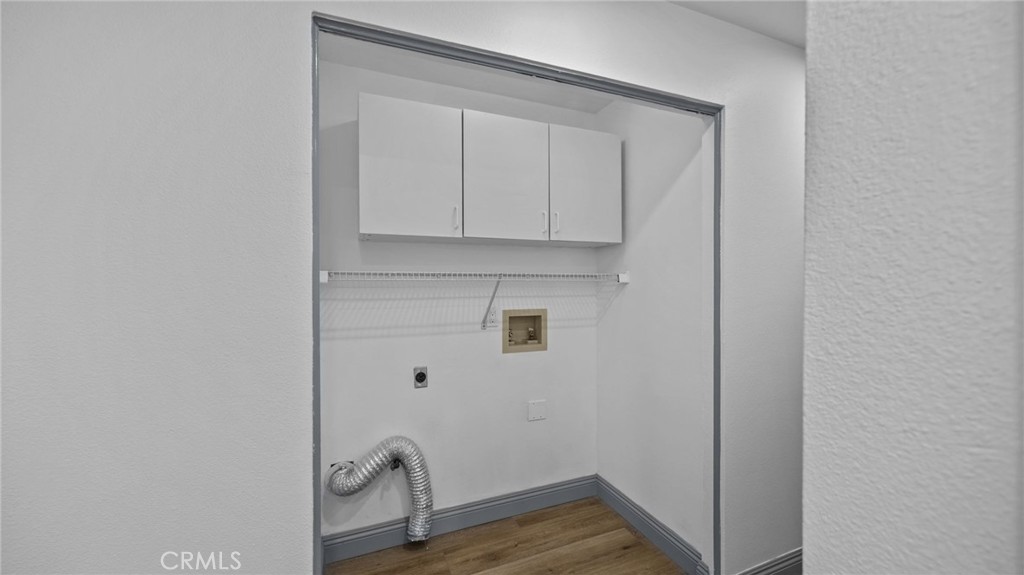 2901 Vía Toscana, Unit 101 Corona, CA 92879 - Photo 11 of 28 a room with a door