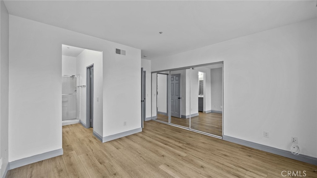 2901 Vía Toscana, Unit 101 Corona, CA 92879 - Photo 14 of 28 a view of wooden floor in an empty room