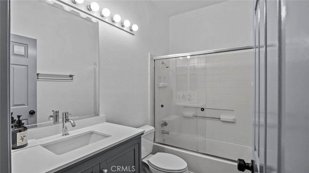 2901 Vía Toscana, Unit 101 Corona, CA 92879 - Photo 19 of 28 a bathroom with a sink toilet and shower
