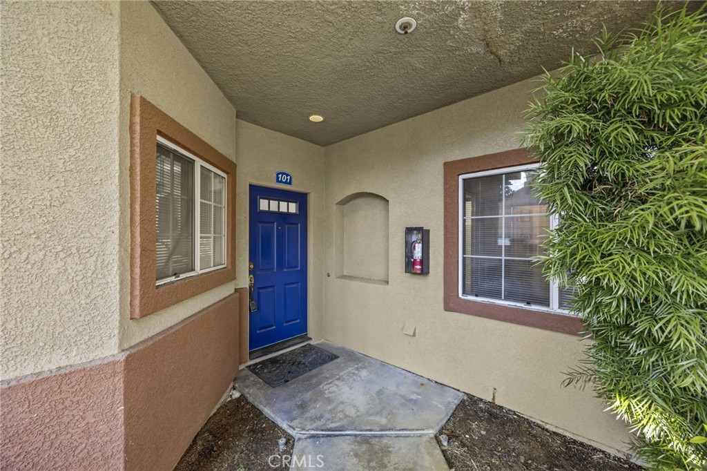 2901 Vía Toscana, Unit 101 Corona, CA 92879 - Photo 4 of 28 a view of front door of a house