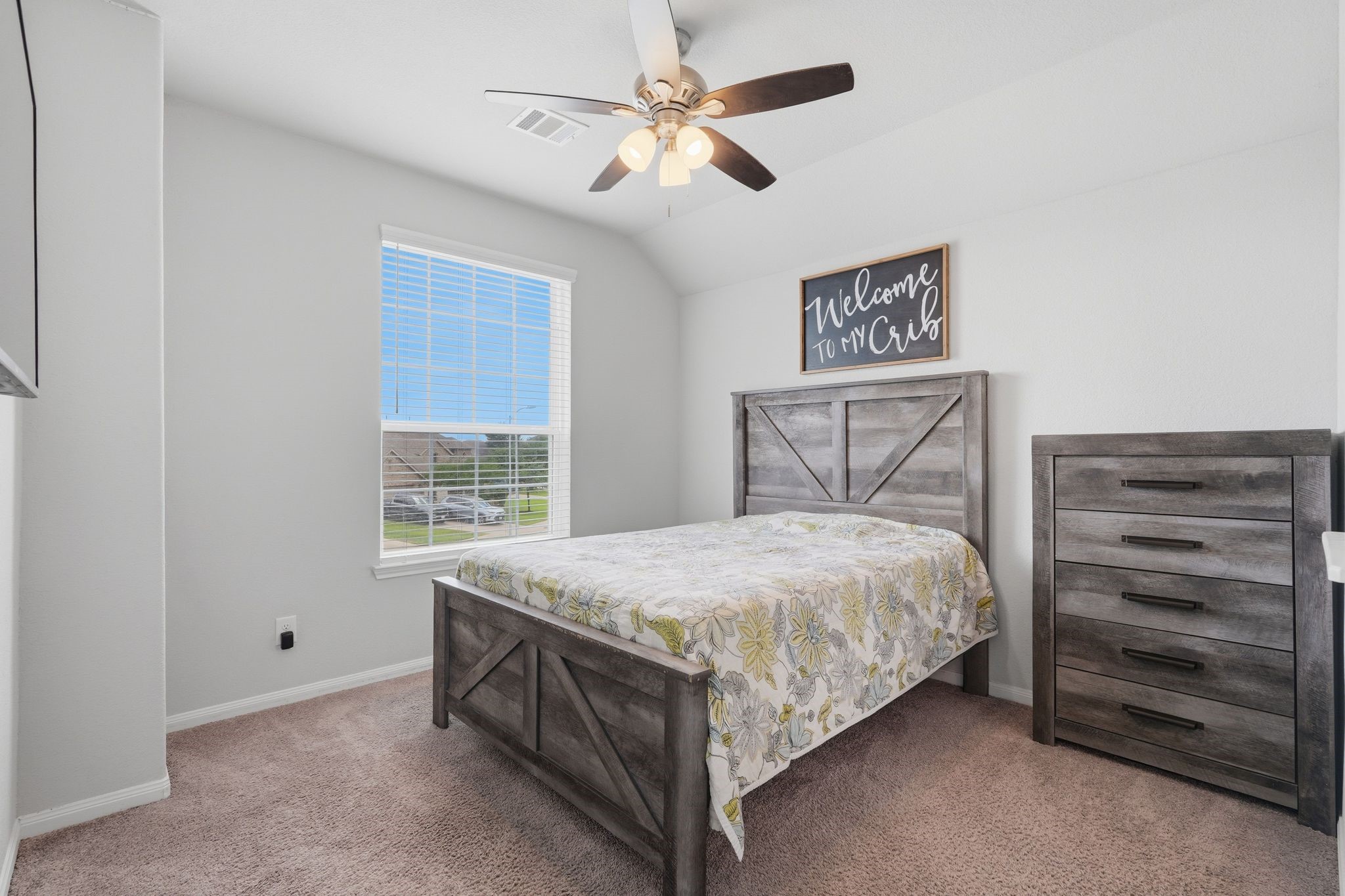 7522 Windsor View Drive Spring, TX 77379 - Photo 35 of 49 Cozy bedroom with soft lighting and a welcoming feel.