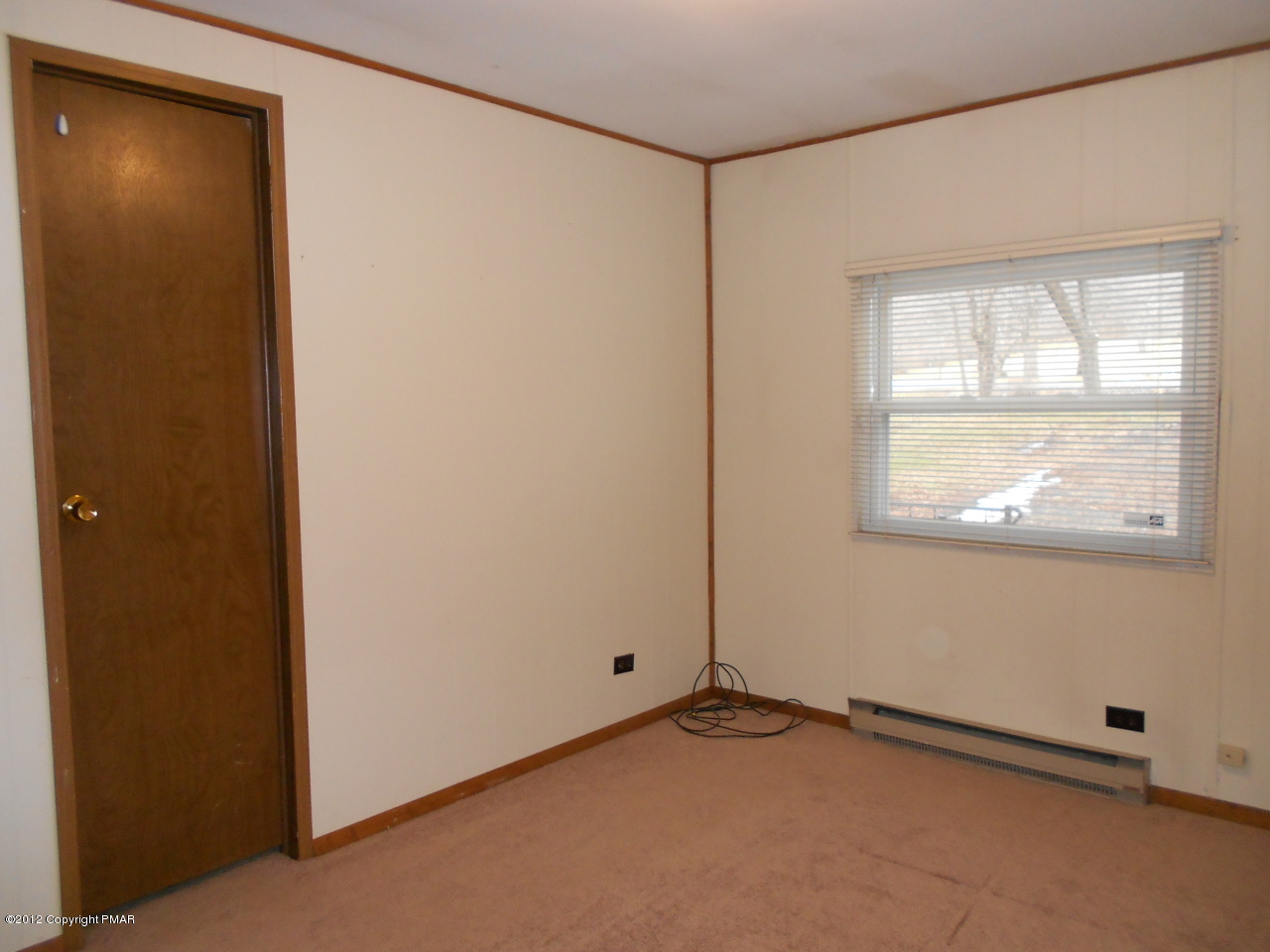 338 Summit Road Swiftwater, PA 18370 - Photo 11 of 15 a view of an empty room with a window