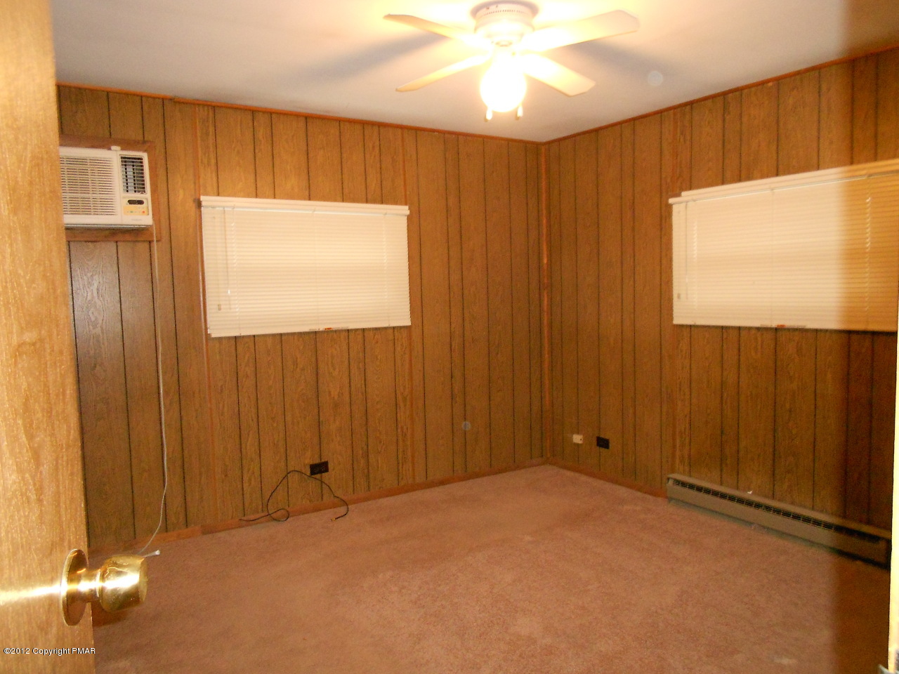 338 Summit Road Swiftwater, PA 18370 - Photo 13 of 15 a view of an empty room with a window