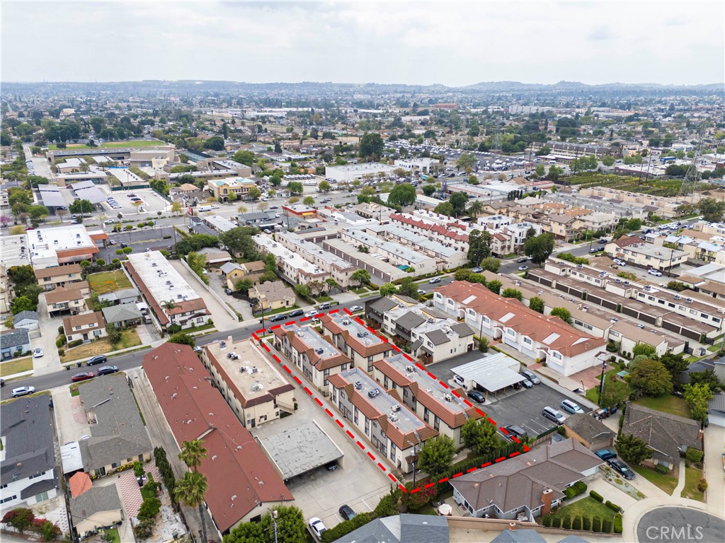 an aerial view of a city with lots of residential buildings