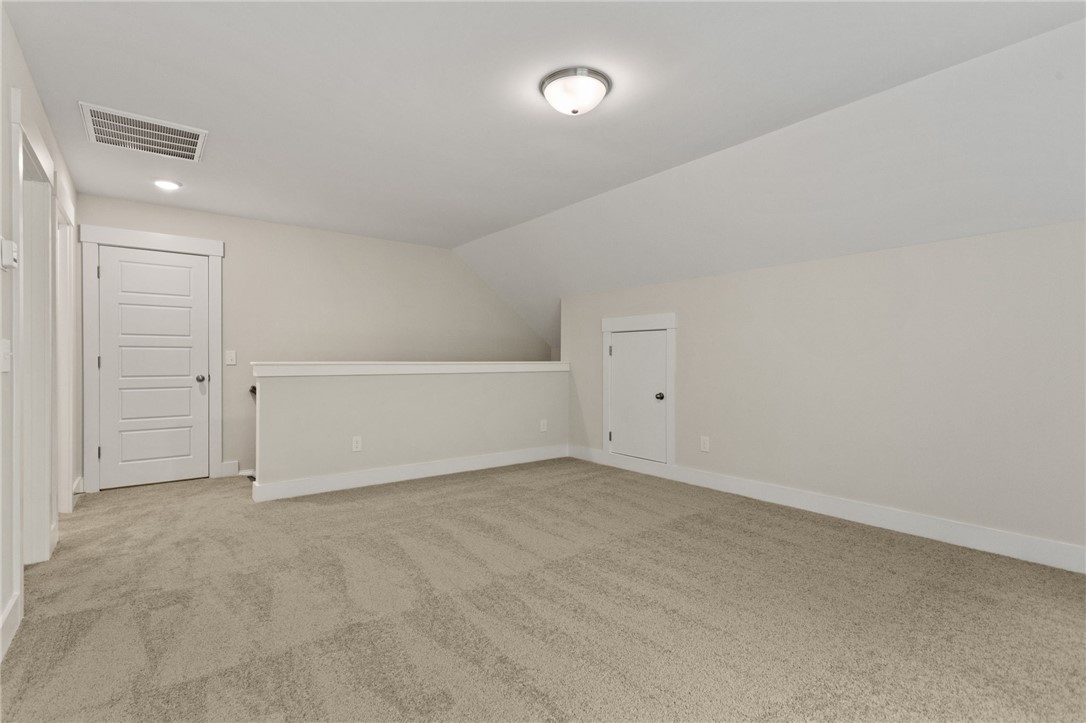 315 Old Shirley Road Central, SC 29630 - Photo 23 of 26 This spacious loft offers ample room for various uses, providing a versatile living area.