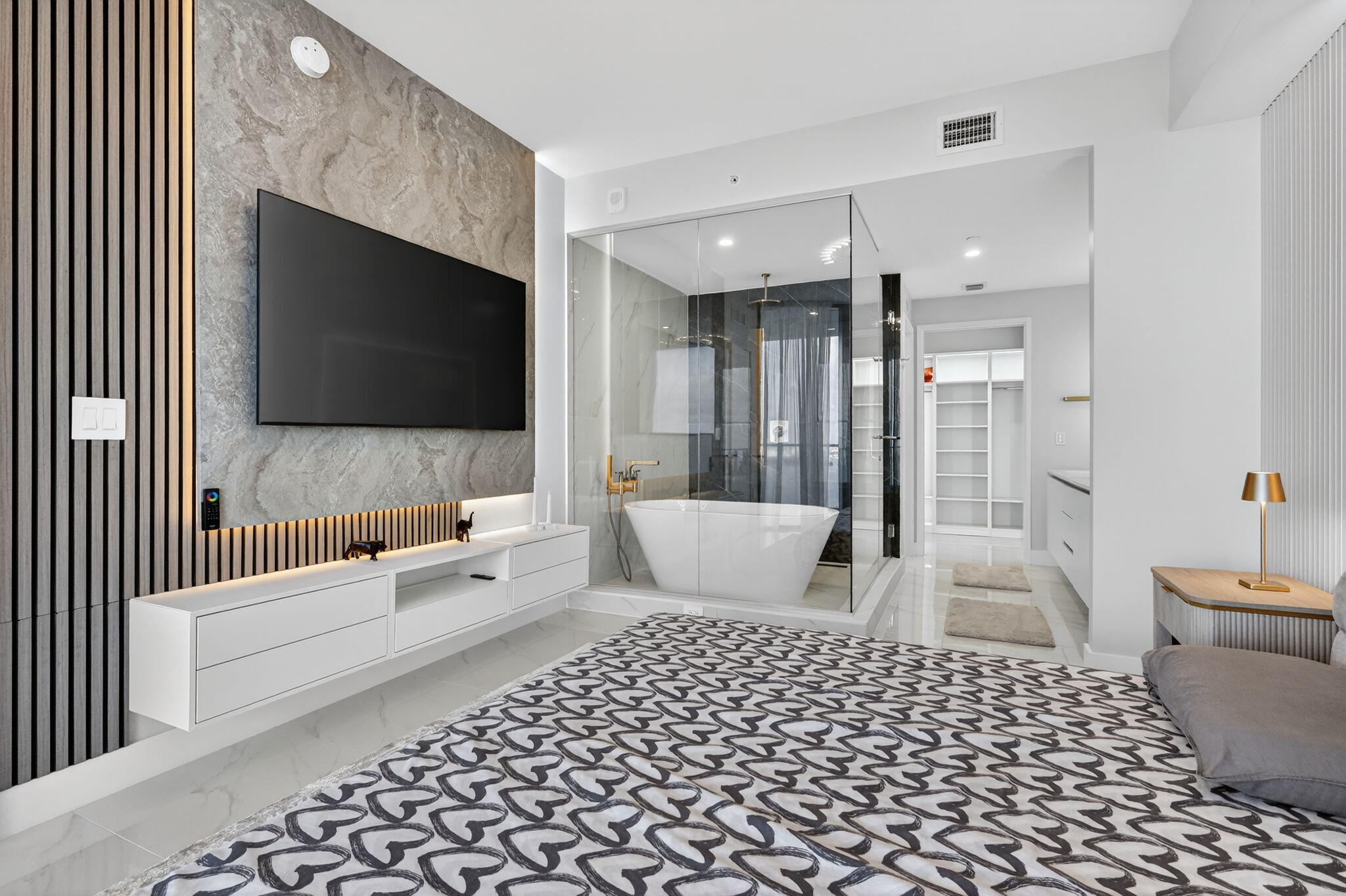 700 Northeast 23rd Street, Unit 3206 Miami, FL 33137 - Photo 11 of 37 a living room with furniture and a flat screen tv