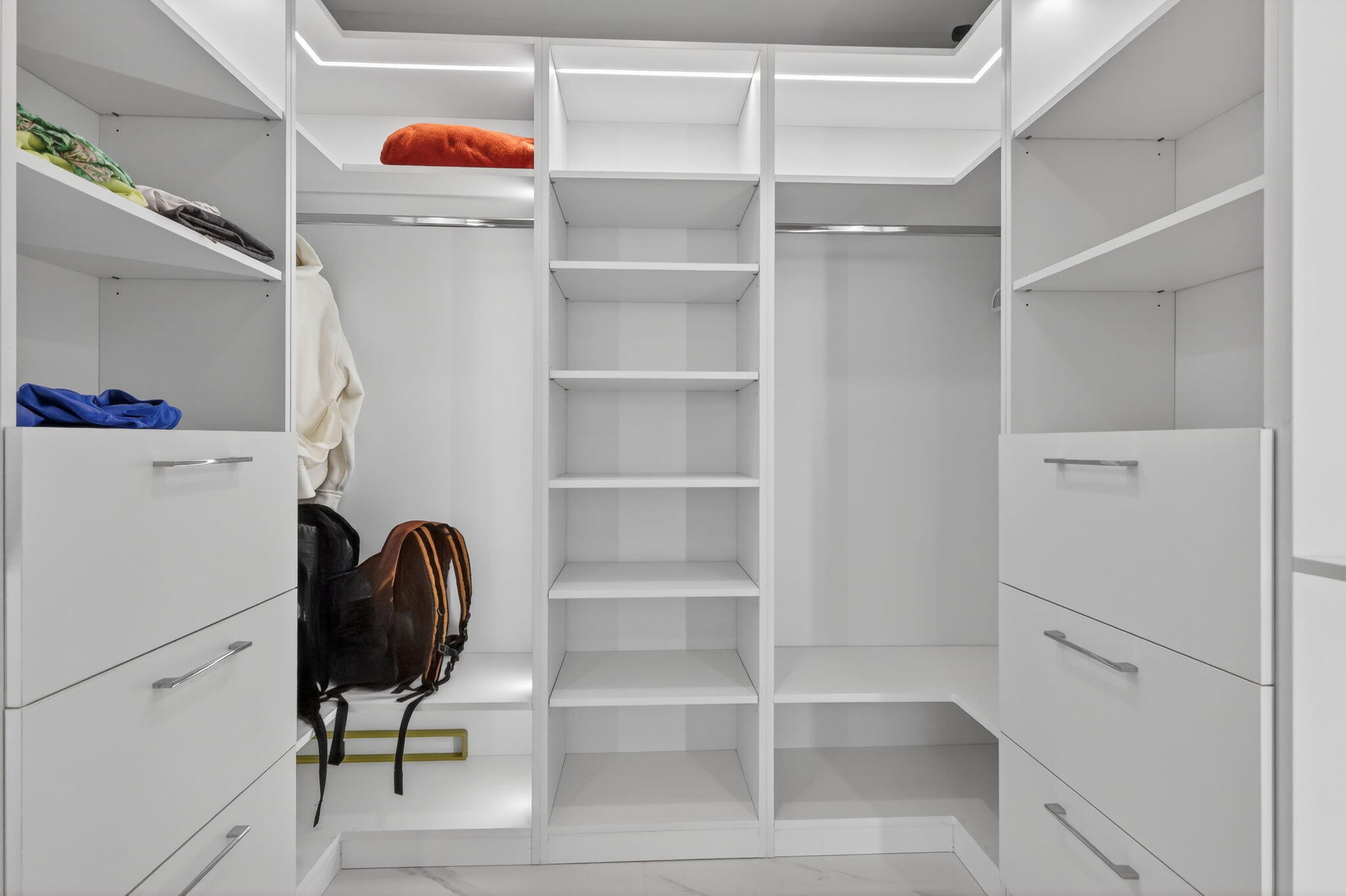 700 Northeast 23rd Street, Unit 3206 Miami, FL 33137 - Photo 17 of 37 a view of walk in closet with empty racks