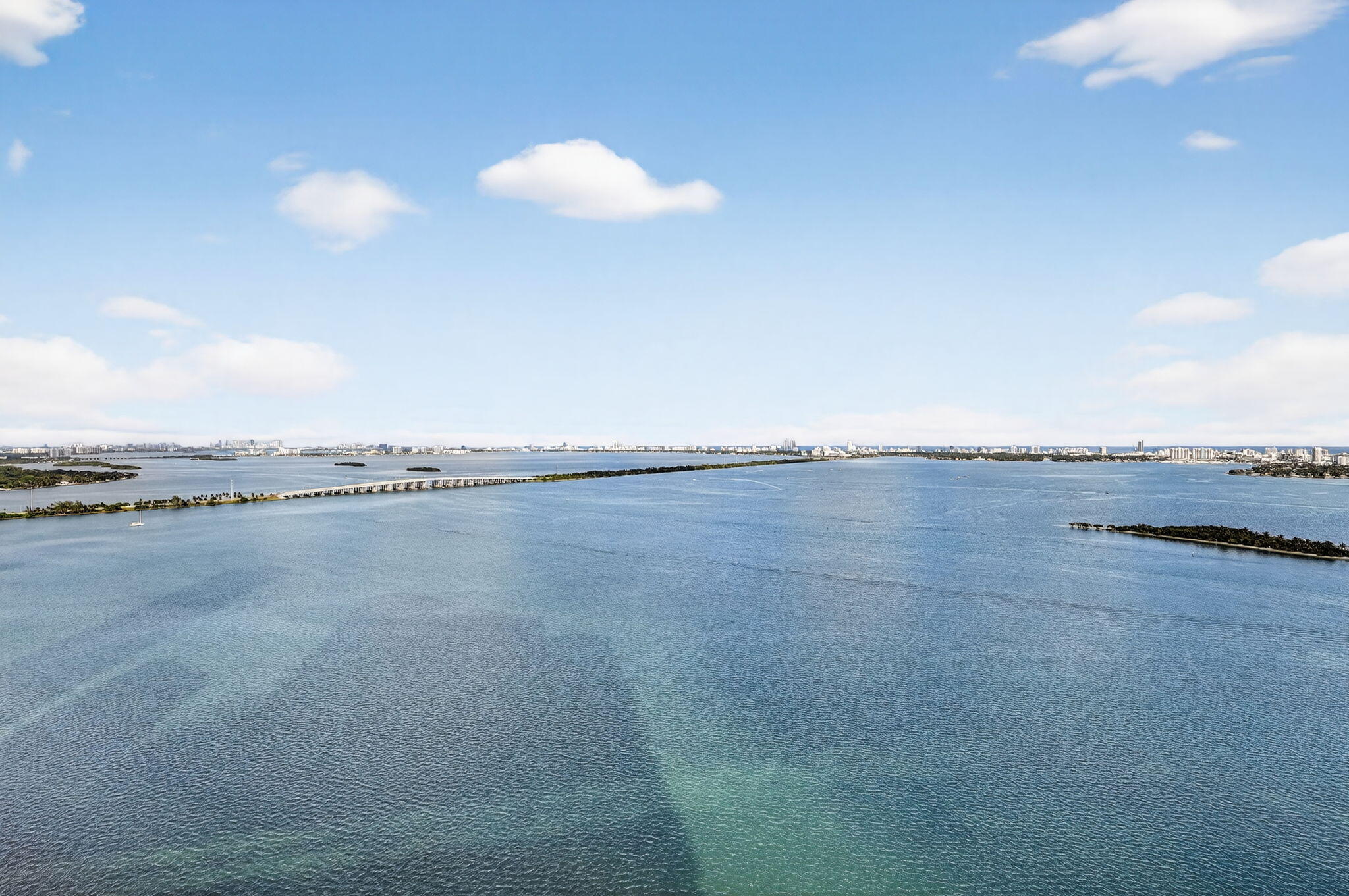 700 Northeast 23rd Street, Unit 3206 Miami, FL 33137 - Photo 34 of 37 a view of an ocean and mountain