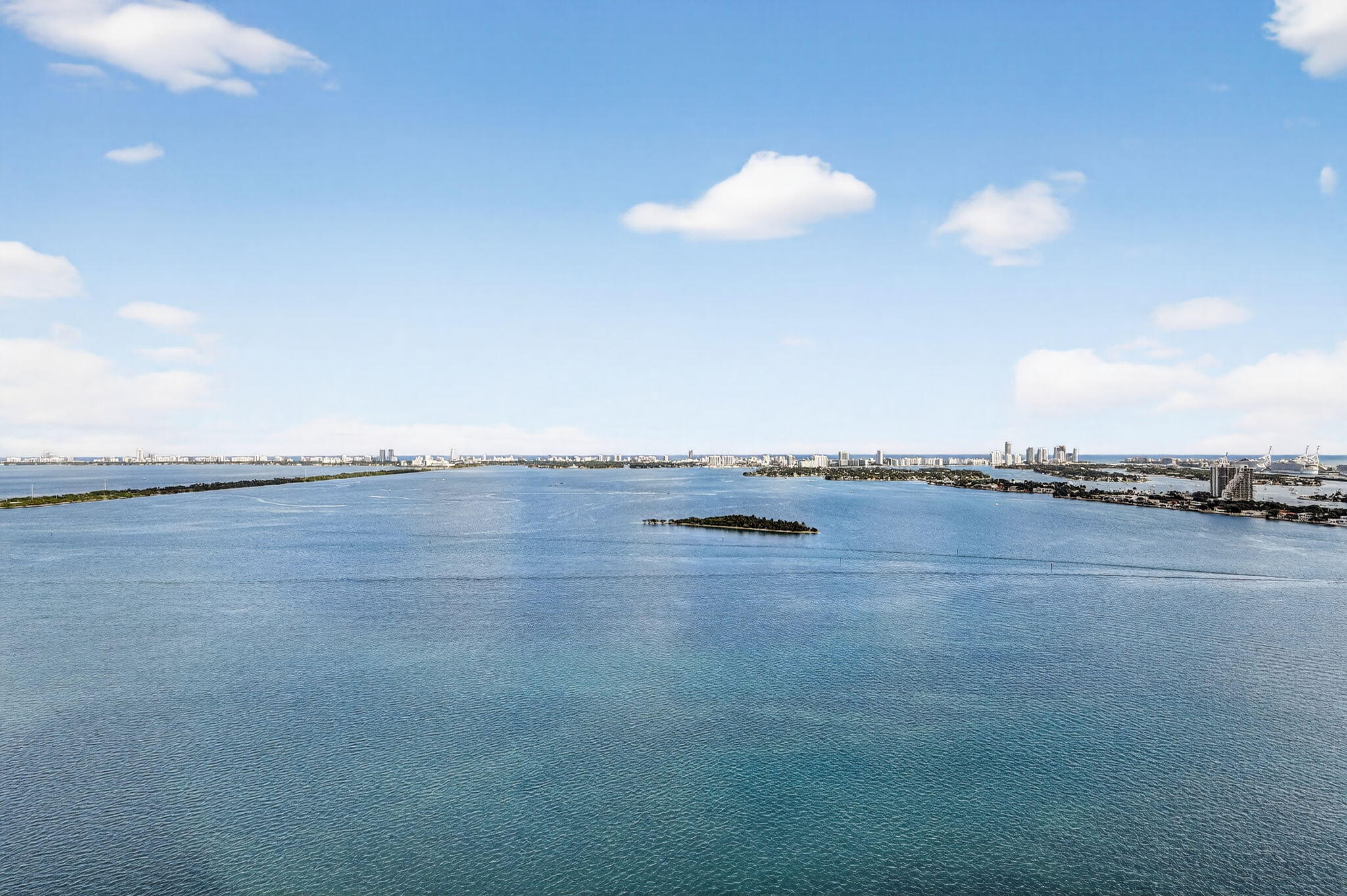 700 Northeast 23rd Street, Unit 3206 Miami, FL 33137 - Photo 35 of 37 a view of a lake and a mountain