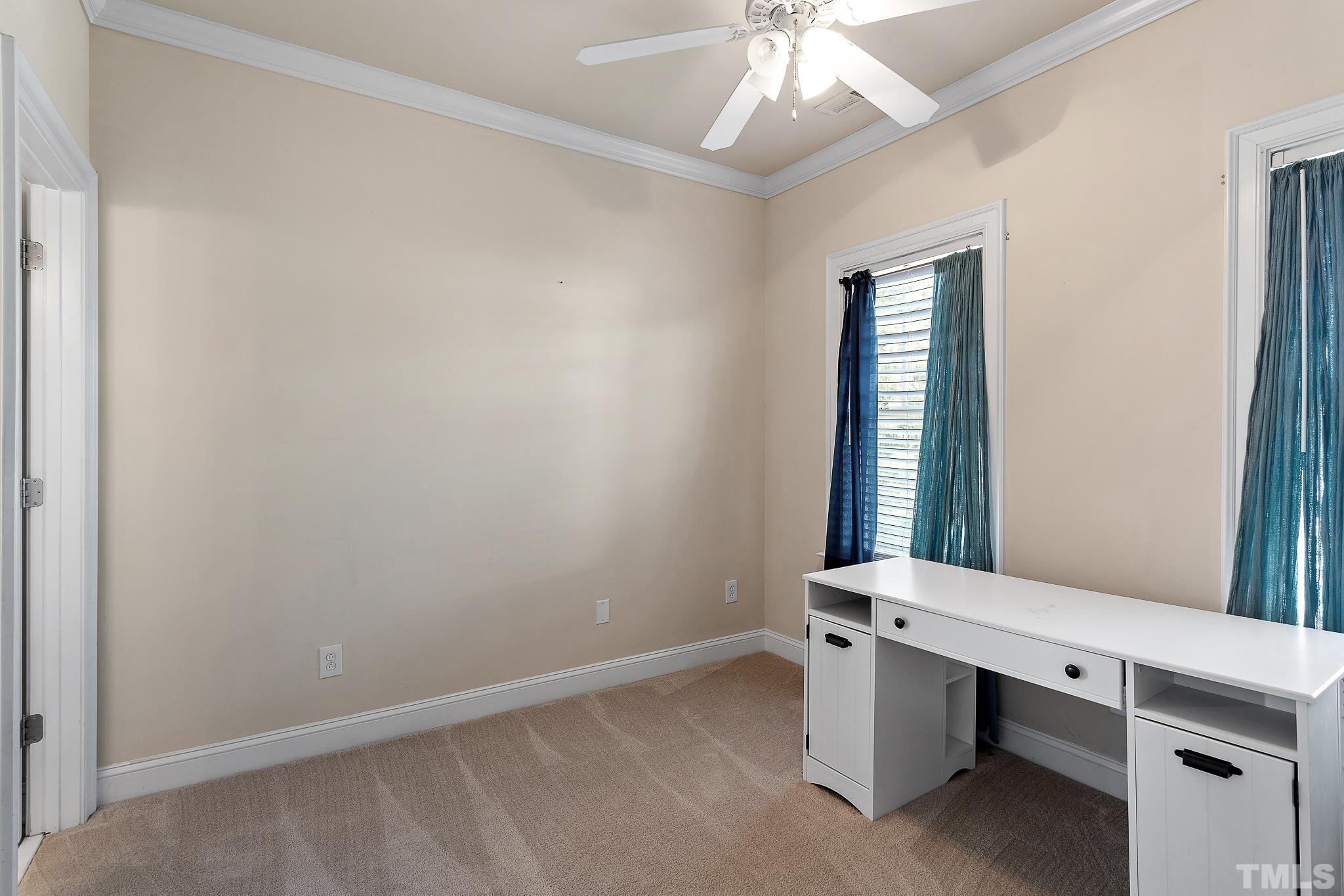 7708 Alexander Promenade Place Raleigh, NC 27617 - Photo 18 of 27 wooden floor and window in a room
