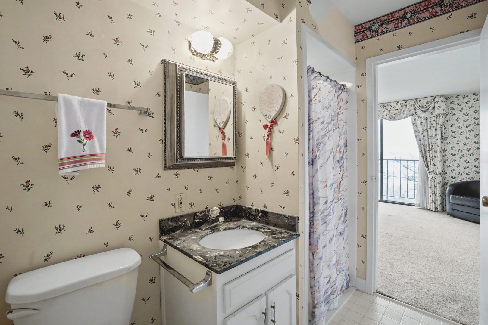 1800 7th Street, Unit 5D East Moline, IL 61244 - Photo 19 of 24 a bathroom with a sink toilet and shower