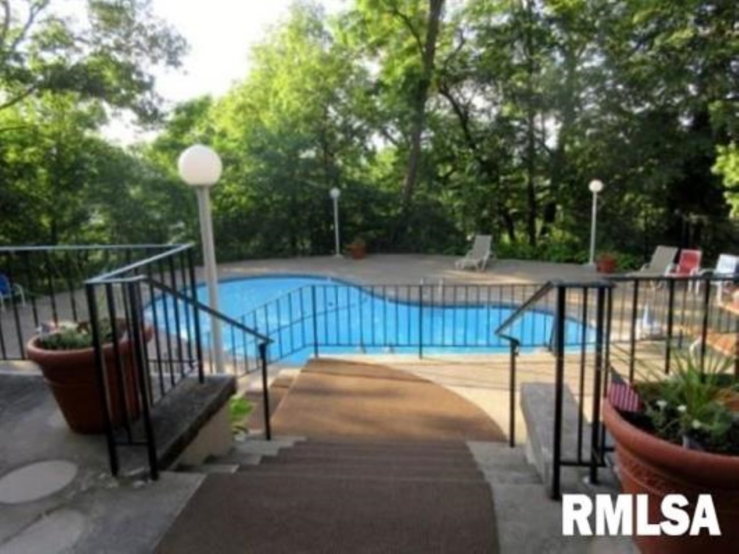 1800 7th Street, Unit 5D East Moline, IL 61244 - Photo 23 of 24 a view of a tennis court