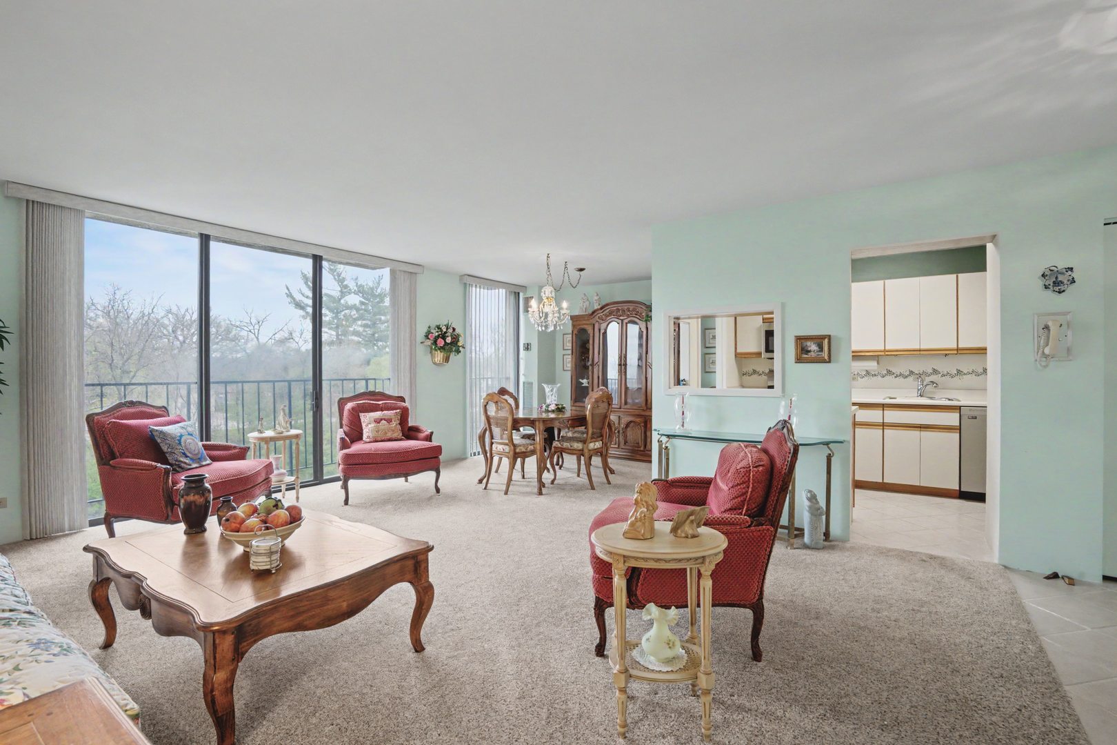 1800 7th Street, Unit 5D East Moline, IL 61244 - Photo 5 of 24 a living room with furniture and a large window