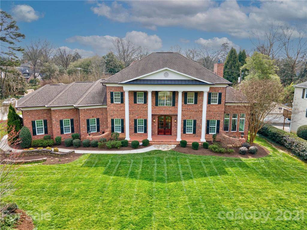 2105 South Wendover Road Charlotte, NC 28211 - Photo 3 of 46 a front view of a house with a yard
