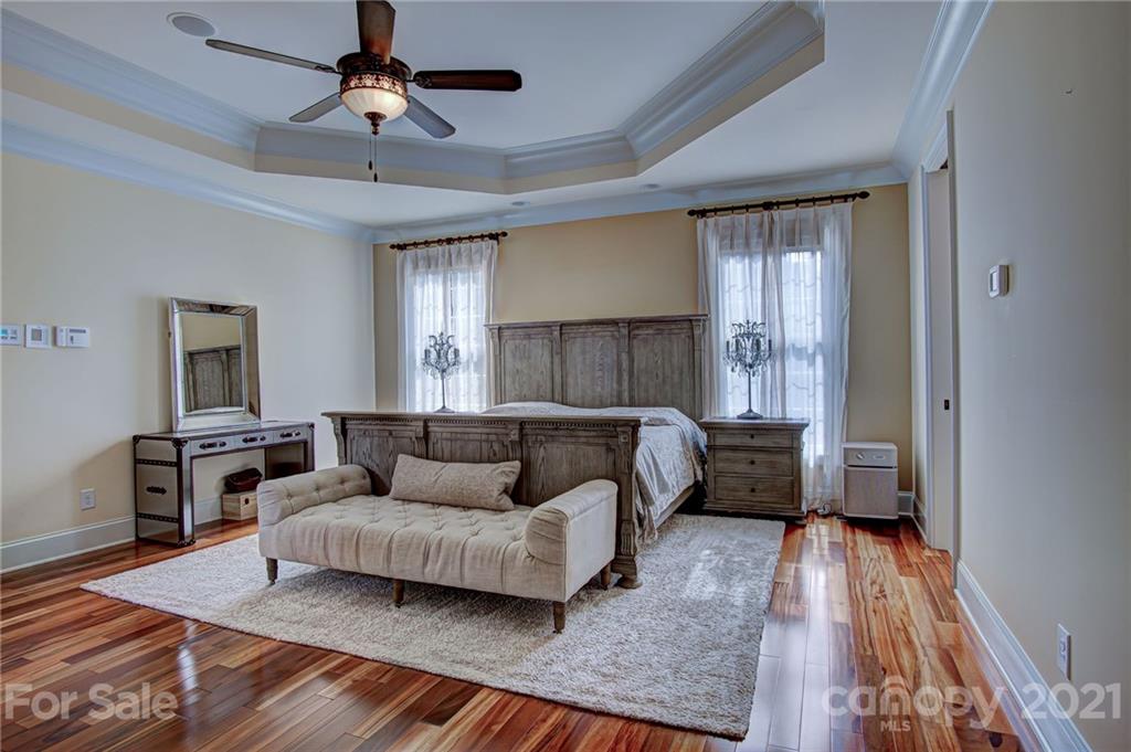2105 South Wendover Road Charlotte, NC 28211 - Photo 22 of 46 a living room with furniture and a wooden floor