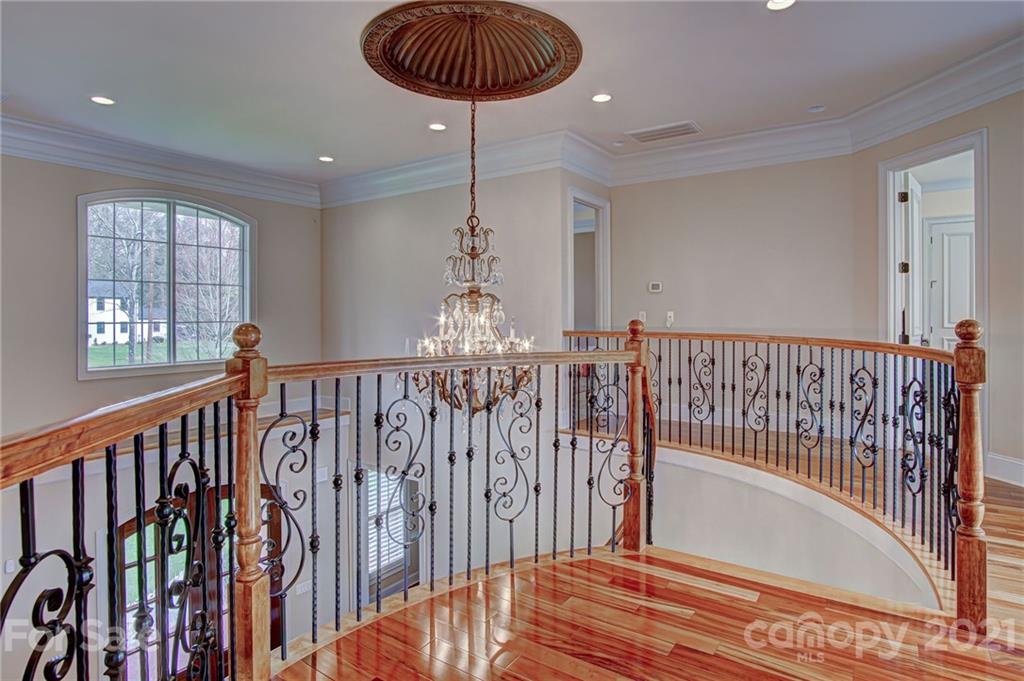 2105 South Wendover Road Charlotte, NC 28211 - Photo 28 of 46 a view of entryway with wooden floor