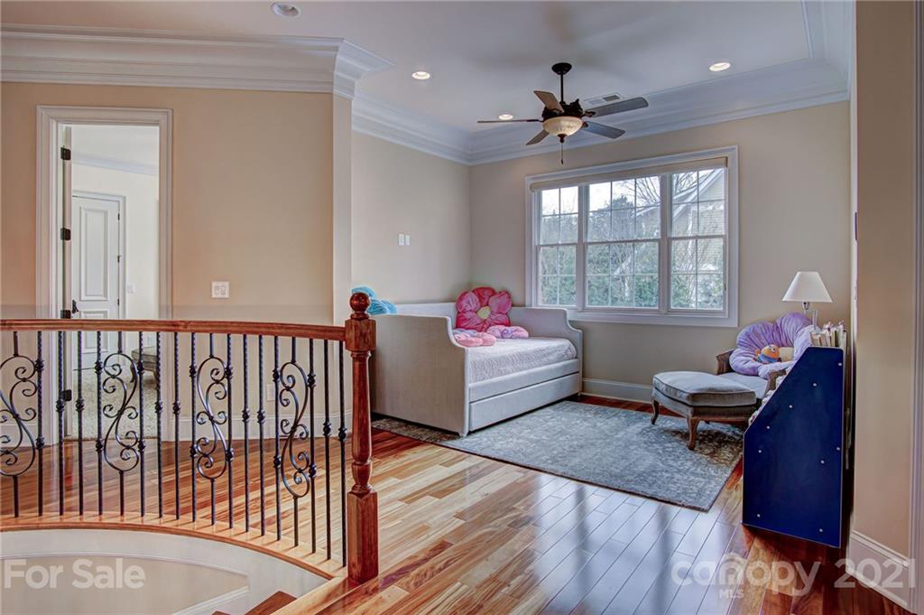2105 South Wendover Road Charlotte, NC 28211 - Photo 29 of 46 a living room with furniture and wooden floor