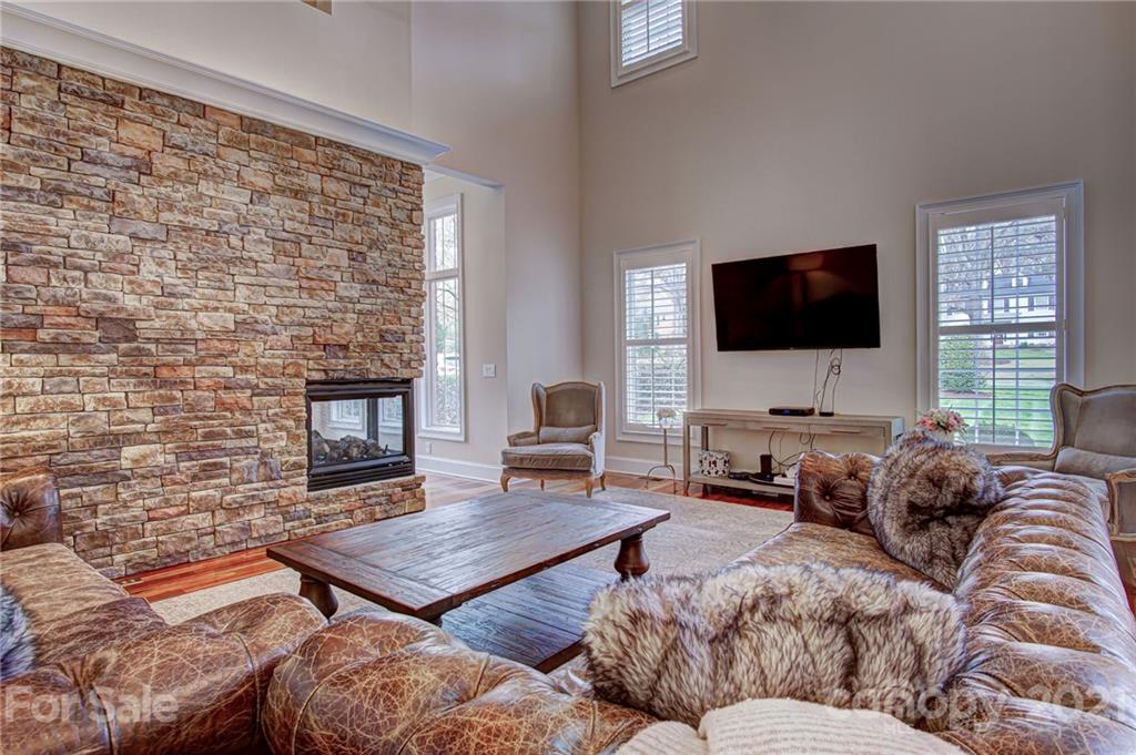 2105 South Wendover Road Charlotte, NC 28211 - Photo 5 of 46 a living room with furniture and a flat screen tv