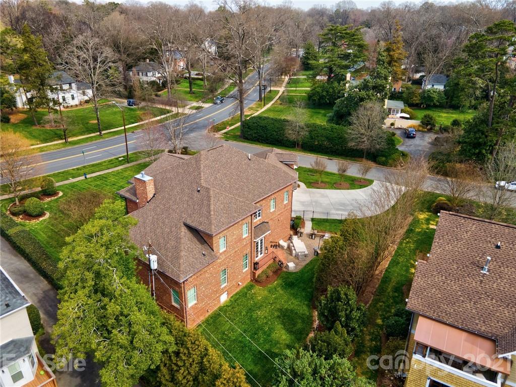 2105 South Wendover Road Charlotte, NC 28211 - Photo 41 of 46 an aerial view of a house with a garden and lake view