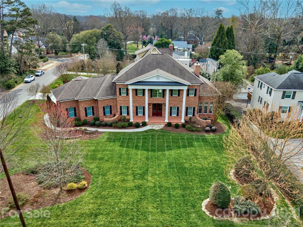 2105 South Wendover Road Charlotte, NC 28211 - Photo 43 of 46 a view of a house with a big yard and large trees