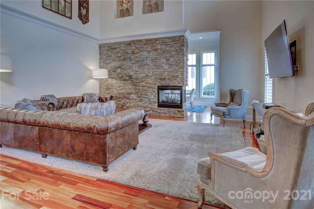2105 South Wendover Road Charlotte, NC 28211 - Photo 6 of 46 a living room with furniture and a fireplace