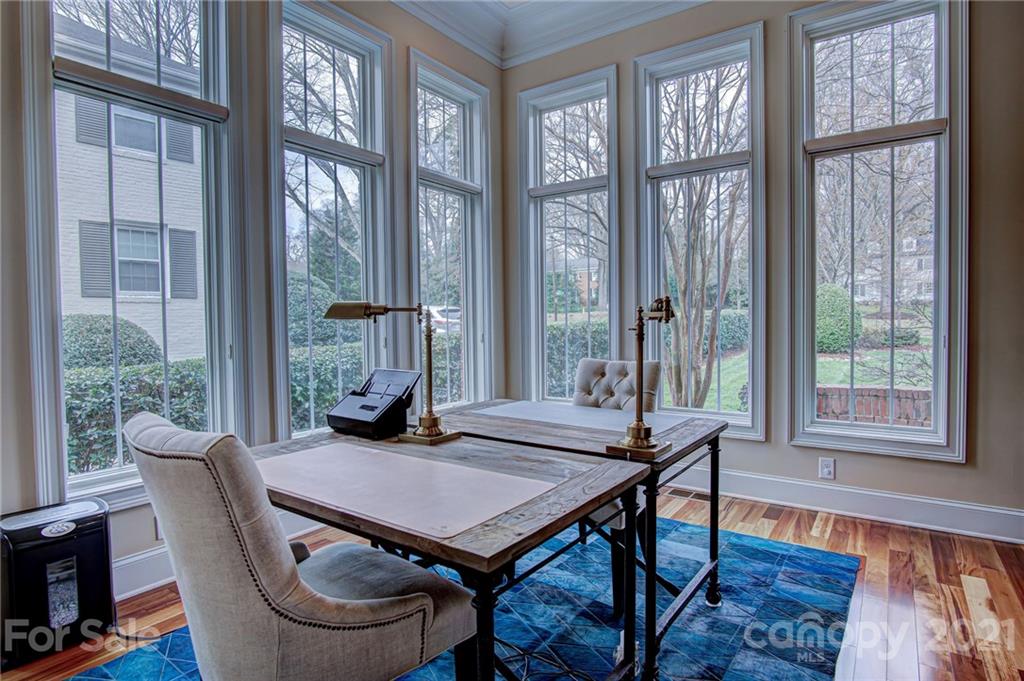2105 South Wendover Road Charlotte, NC 28211 - Photo 8 of 46 a view of a dining room with furniture window and wooden floor