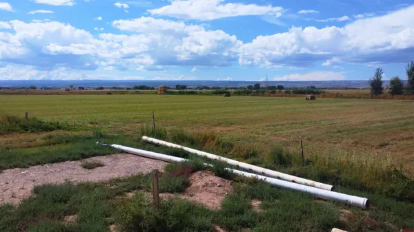 a view of a lake with a yard