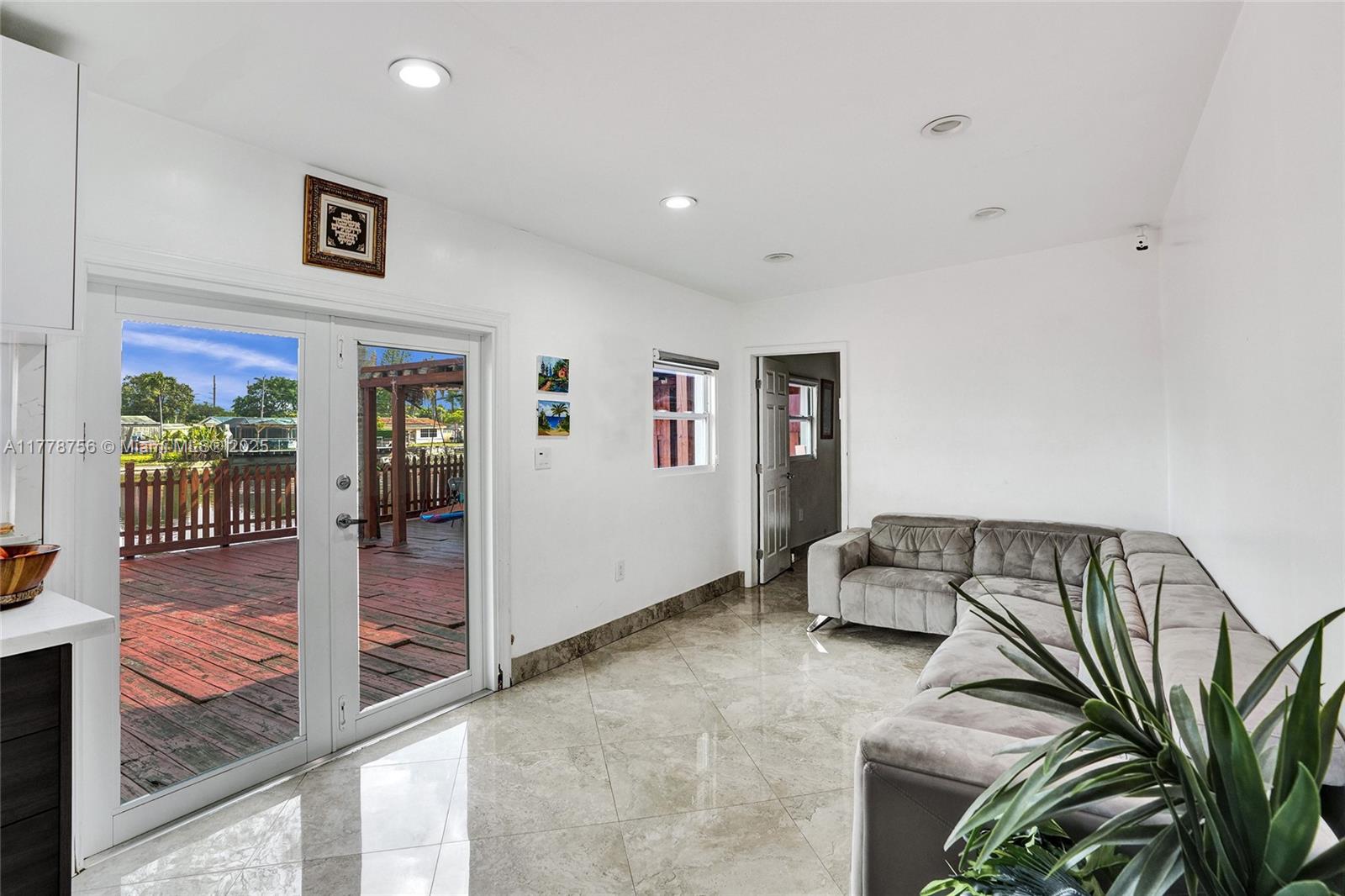 4185 Southwest 49th Court Dania Beach, FL 33314 - Photo 8 of 21 a view of a hallway with workspace