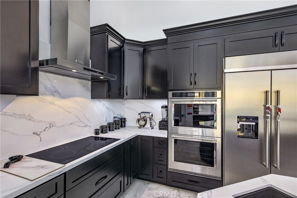 39625 County Line Road Beaumont, CA 92223 - Photo 14 of 54 Built ins including refrigerator and inductive cook top
