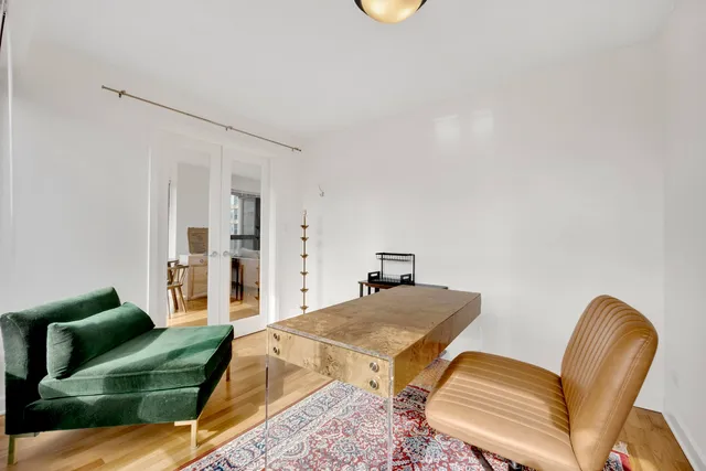 a bedroom with furniture and a couch