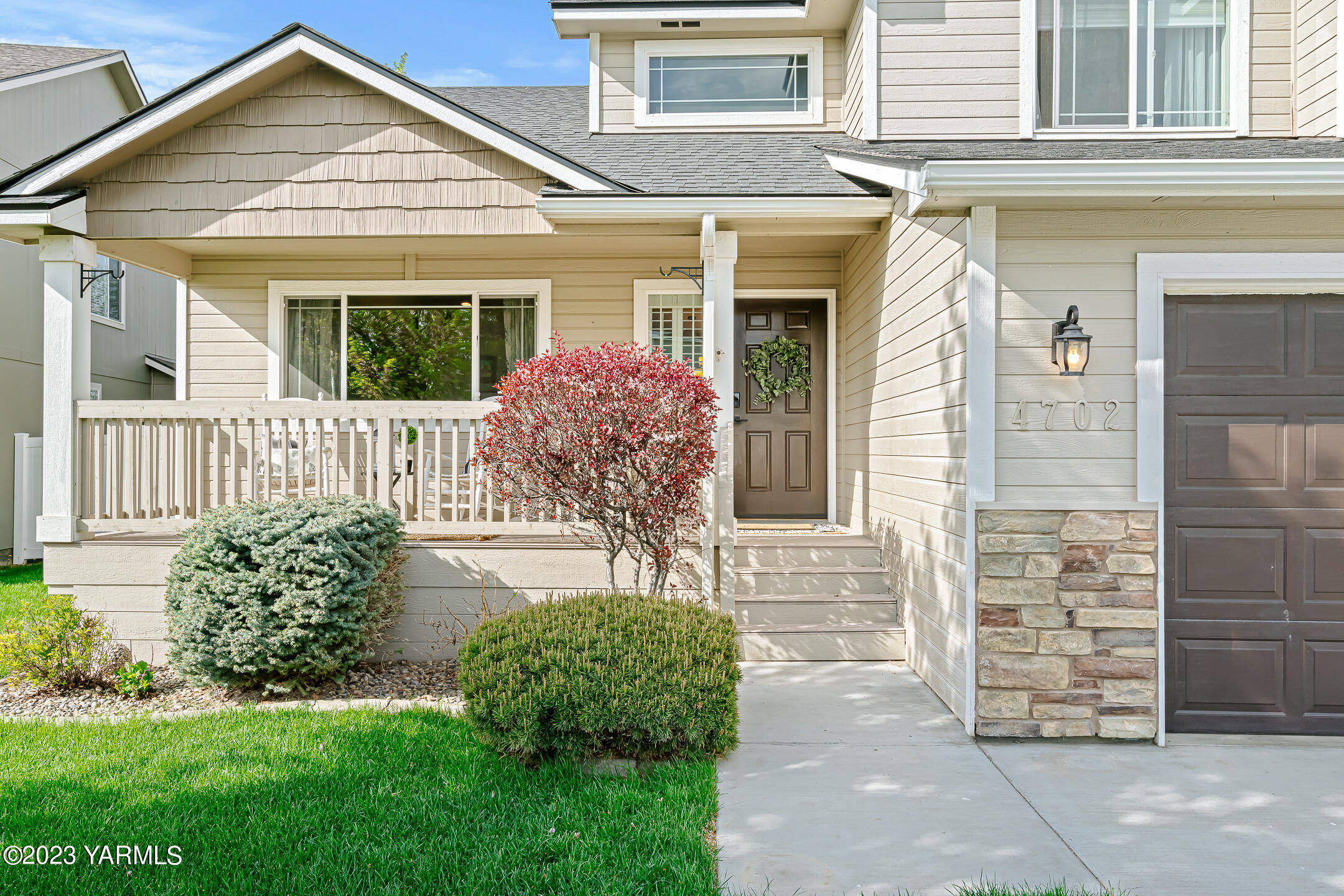 4702 Goat Rocks Court Yakima, WA 98901 - Photo 2 of 36 front view of a house with a yard