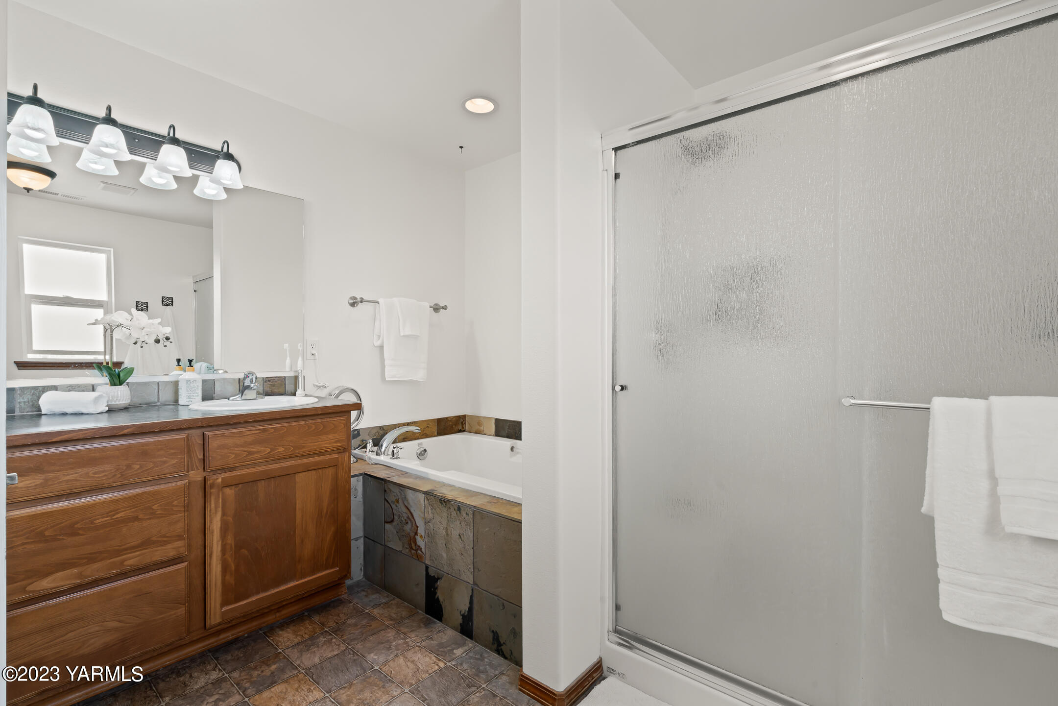 4702 Goat Rocks Court Yakima, WA 98901 - Photo 24 of 36 a room with a sink and cabinets