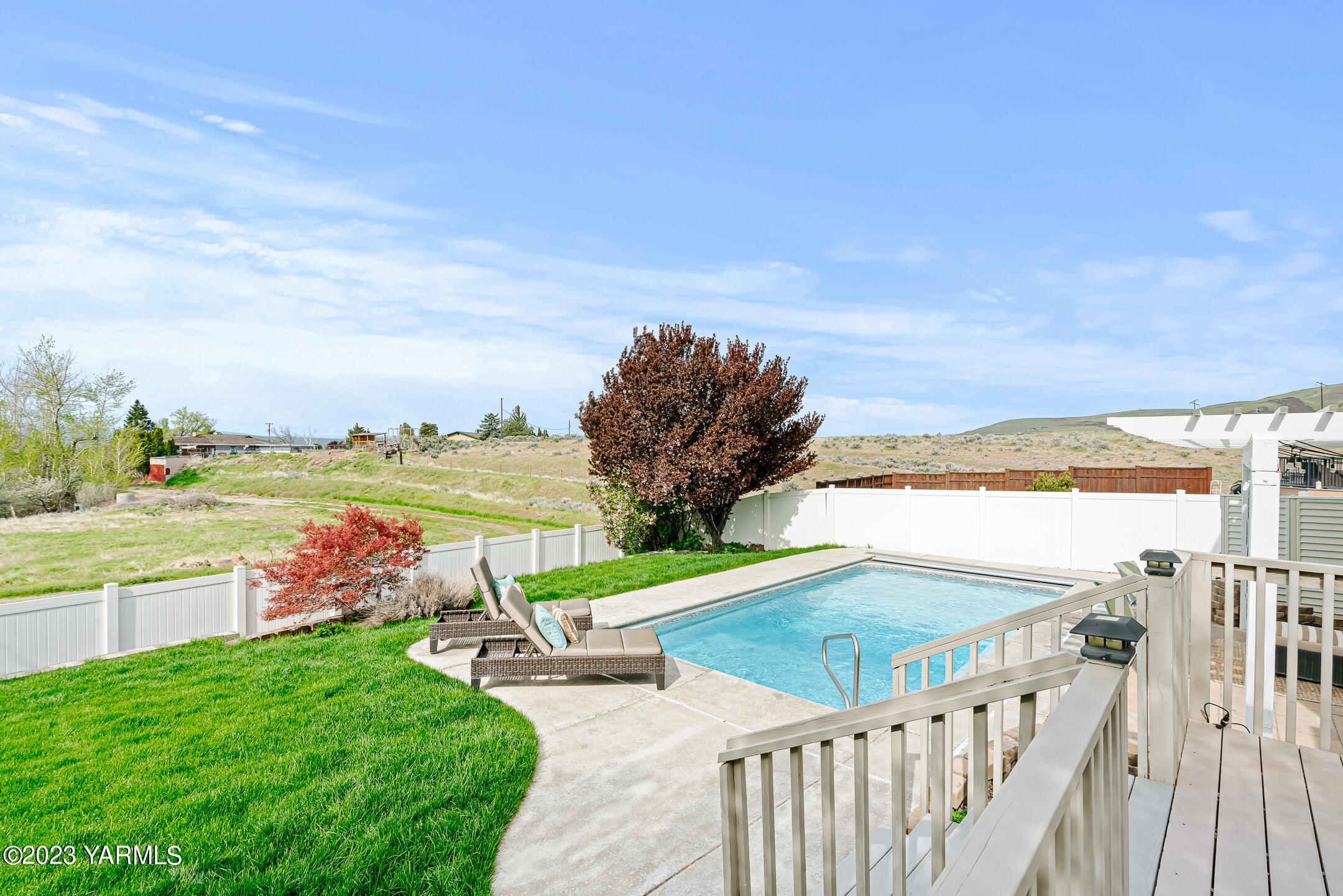 4702 Goat Rocks Court Yakima, WA 98901 - Photo 28 of 36 a view of a balcony with an ocean beach
