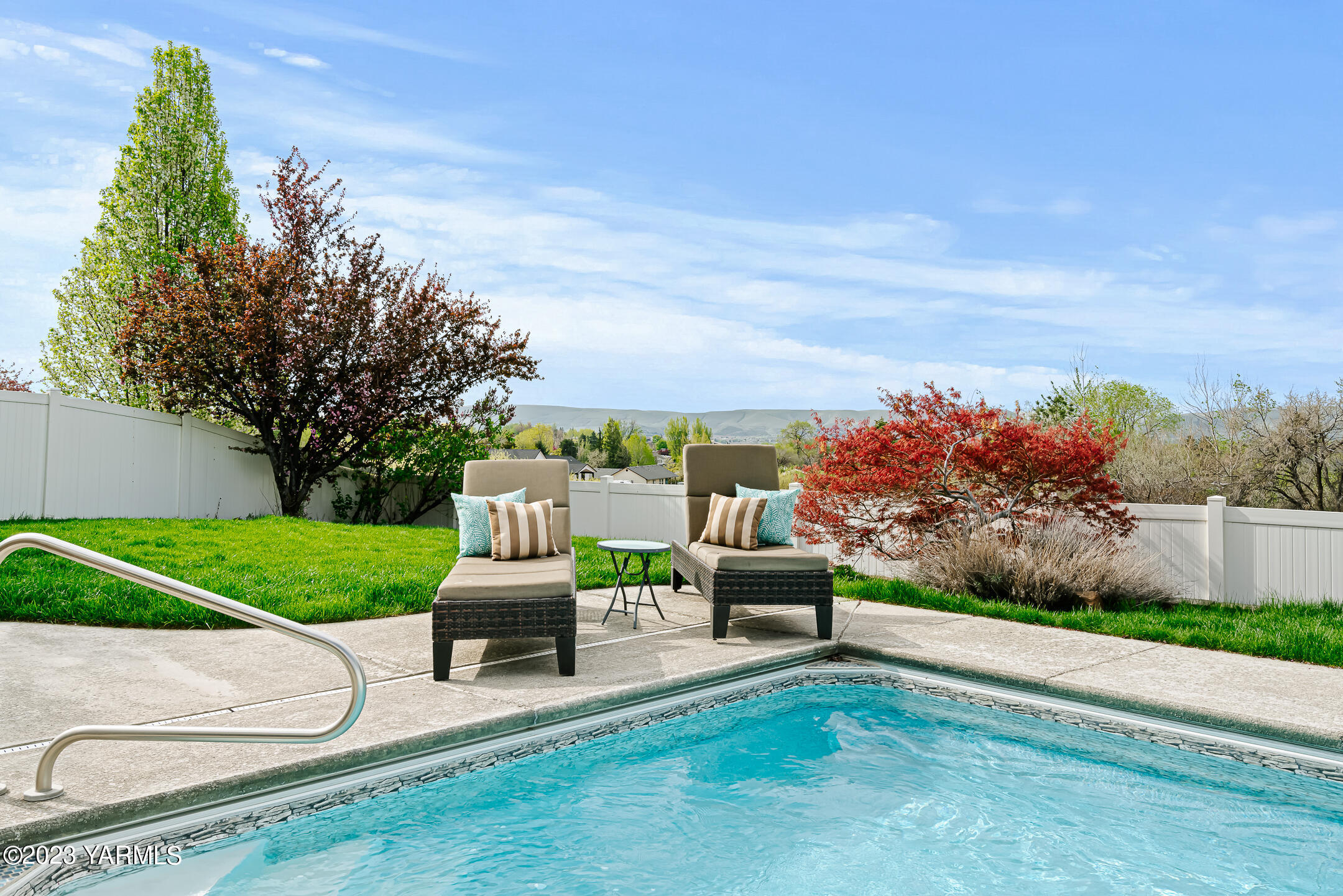4702 Goat Rocks Court Yakima, WA 98901 - Photo 31 of 36 a front view of a house with a yard