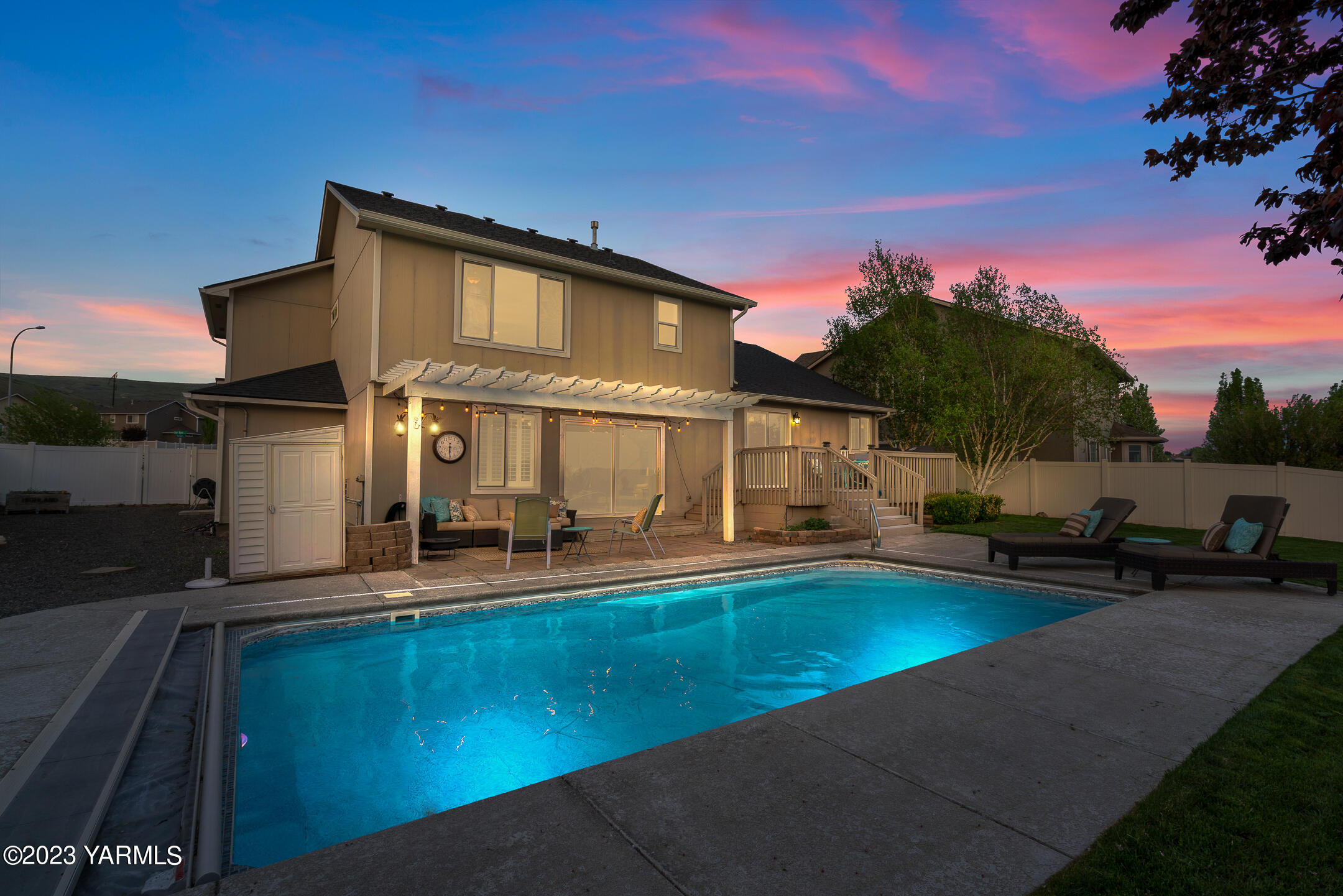4702 Goat Rocks Court Yakima, WA 98901 - Photo 36 of 36 a view of a house with swimming pool and sitting area
