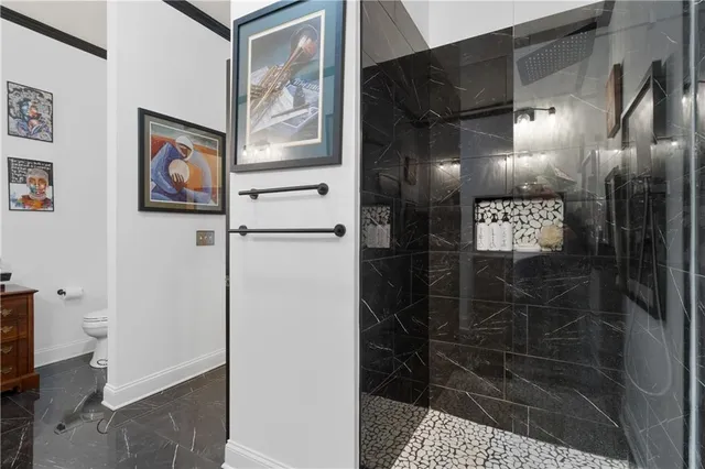 a bathroom with a sink mirror and vanity